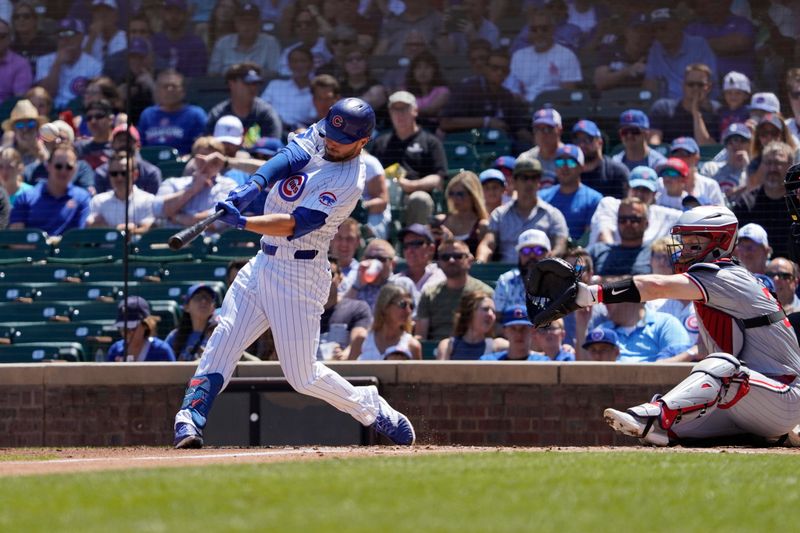 Aug 7, 2024; Chicago, Illinois, USA; Chicago Cubs first baseman Michael Busch (29) hits a home run against the Minnesota Twins during the first inning at Wrigley Field. Mandatory Credit: David Banks-USA TODAY Sports