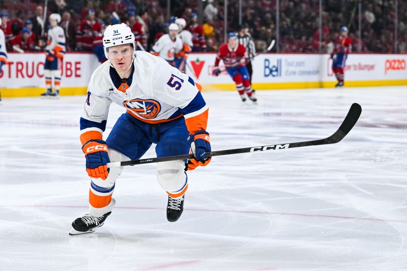 Mar 21, 2026; Montreal, Quebec, CAN; New York Islanders left wing Emil Heineman (51) skates against the Montreal Canadiens during the second period at Bell Centre. Mandatory Credit: David Kirouac-Imagn Images