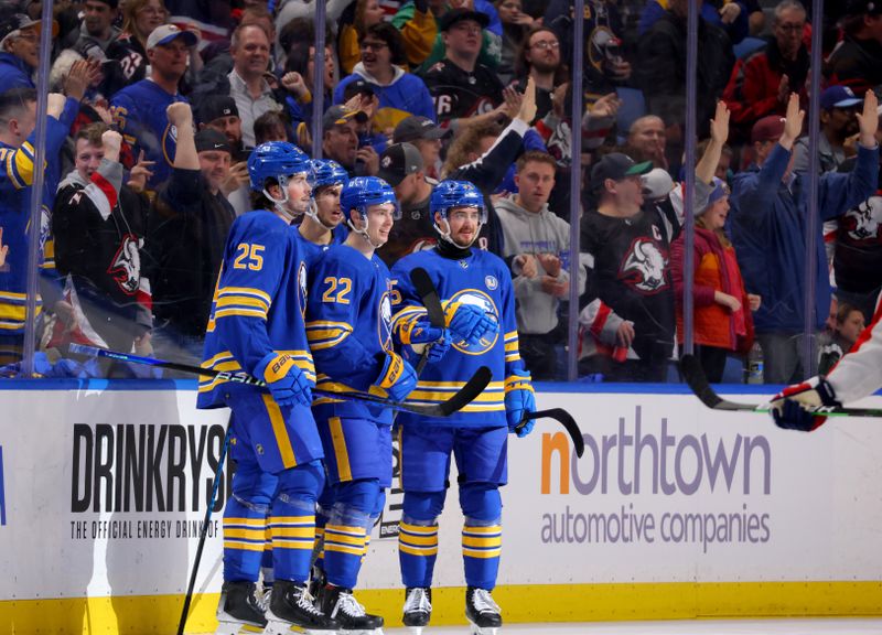 Apr 11, 2024; Buffalo, New York, USA;  Buffalo Sabres right wing Jack Quinn (22) celebrates his goal with teammates during the third period against the Washington Capitals at KeyBank Center. Mandatory Credit: Timothy T. Ludwig-USA TODAY Sports