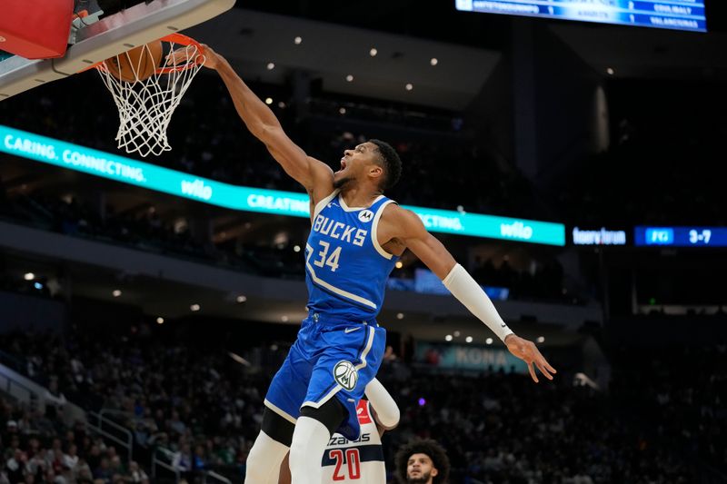 MILWAUKEE, WISCONSIN - NOVEMBER 30: Giannis Antetokounmpo #34 of the Milwaukee Bucks dunks the ball against the Washington Wizards during the first quarter of a game at Fiserv Forum on November 30, 2024 in Milwaukee, Wisconsin. NOTE TO USER: User expressly acknowledges and agrees that, by downloading and or using this photograph, User is consenting to the terms and conditions of the Getty Images License Agreement. (Photo by Patrick McDermott/Getty Images)