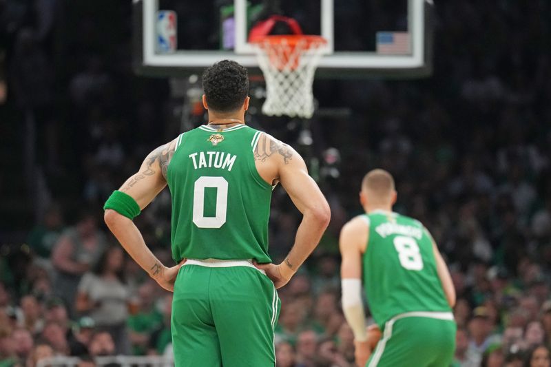 BOSTON, MA - JUNE 17: Jayson Tatum #0 of the Boston Celtics looks on during the game against the Dallas Mavericks during Game 5 of the 2024 NBA Finals on June 17, 2024 at the TD Garden in Boston, Massachusetts. NOTE TO USER: User expressly acknowledges and agrees that, by downloading and or using this photograph, User is consenting to the terms and conditions of the Getty Images License Agreement. Mandatory Copyright Notice: Copyright 2024 NBAE  (Photo by Jesse D. Garrabrant/NBAE via Getty Images)