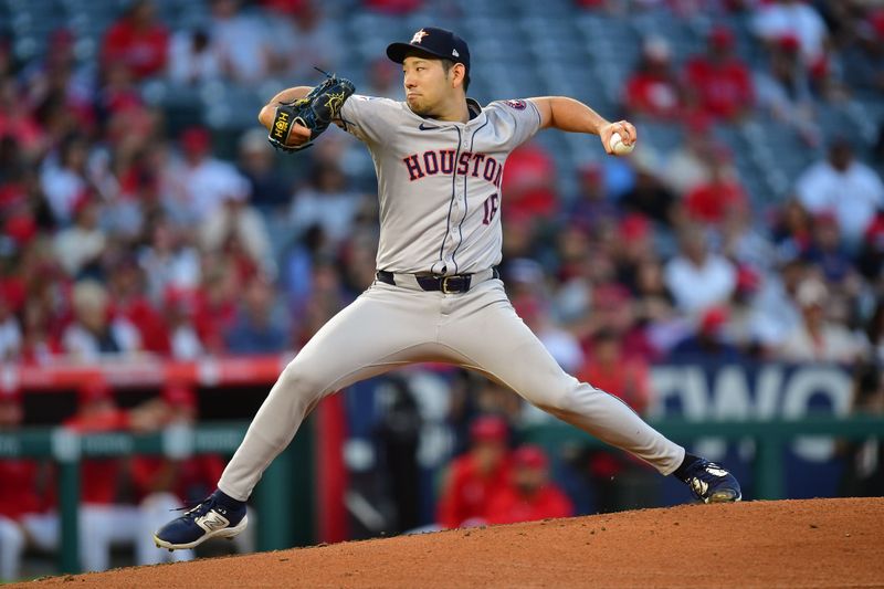 Sep 13, 2024; Anaheim, California, USA; Houston Astros pitcher Yusei Kikuchi (16) throws against the Los Angeles Angels during the first inning at Angel Stadium. Mandatory Credit: Gary A. Vasquez-Imagn Images