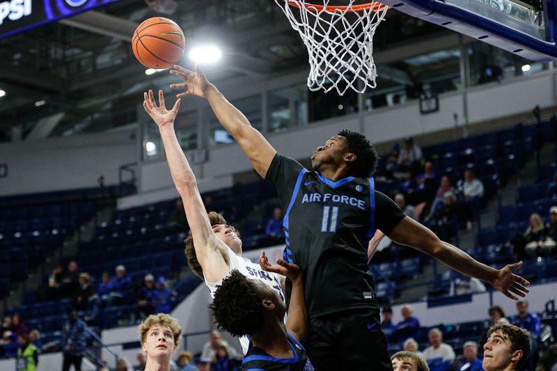 Jan 13, 2024; Colorado Springs, Colorado, USA; San Jose State Spartans guard Garrett Anderson (1) attempts a shot against Air Force Falcons guard Byron Brown (11) in the first half at Clune Arena. Mandatory Credit: Isaiah J. Downing-USA TODAY Sports