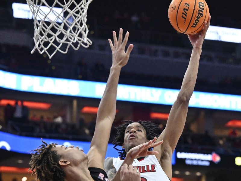 Feb 4, 2023; Louisville, Kentucky, USA;  Louisville Cardinals forward JJ Traynor (12) shoots against Florida State Seminoles forward Cam Corhen (3) during the second half at KFC Yum! Center. Florida State defeated Louisville 81-78. Mandatory Credit: Jamie Rhodes-USA TODAY Sports