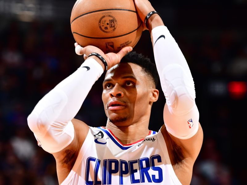 PHOENIX, AZ - APRIL 18: Russell Westbrook  #0 of the LA Clippers shoots a free throw during the game against the Phoenix Suns during Round 1 Game 2 of the 2023 NBA Playoffs on April 18, 2023 at Footprint Center in Phoenix, Arizona. NOTE TO USER: User expressly acknowledges and agrees that, by downloading and or using this photograph, user is consenting to the terms and conditions of the Getty Images License Agreement. Mandatory Copyright Notice: Copyright 2023 NBAE (Photo by Barry Gossage/NBAE via Getty Images)