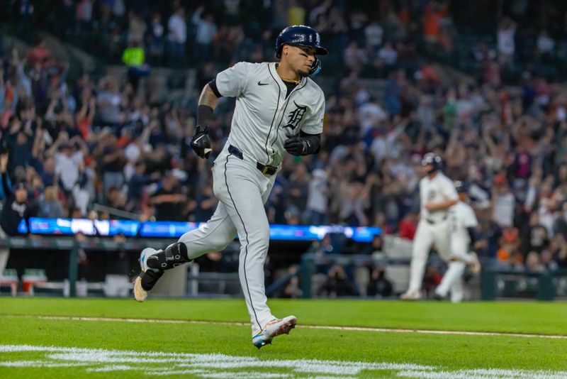 May 13, 2025; Detroit, Michigan, USA; Detroit Tigers third baseman Javier Báez (28) hits a three run RBI home run off of Boston Red Sox pitcher Garrett Whitlock (22) (not pictured) in the sixth inning at Comerica Park. Mandatory Credit: David Reginek-Imagn Images
