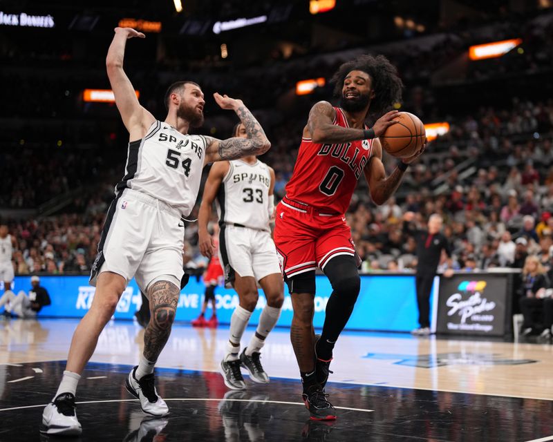 SAN ANTONIO, TX - JANUARY 13: Coby White #0 of the Chicago Bulls passes the ball during the game against the San Antonio Spurs on January 13, 2024 at the Frost Bank Center in San Antonio, Texas. NOTE TO USER: User expressly acknowledges and agrees that, by downloading and or using this photograph, user is consenting to the terms and conditions of the Getty Images License Agreement. Mandatory Copyright Notice: Copyright 2024 NBAE (Photos by Darren Carroll/NBAE via Getty Images)