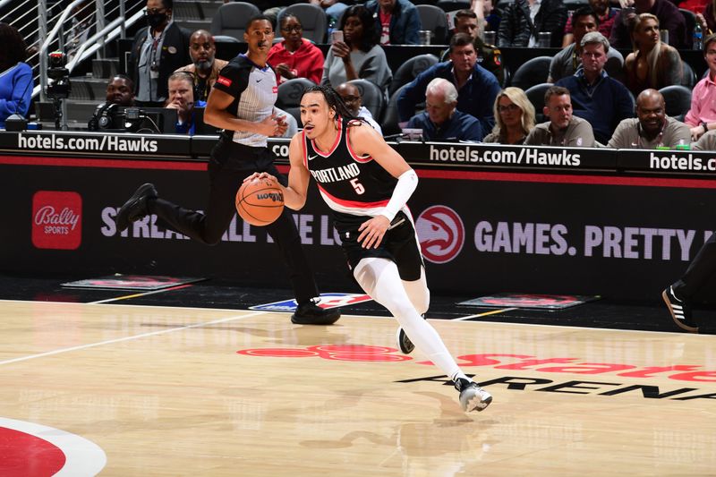 ATLANTA, GA - MARCH 27: Dalano Banton #5 of the Portland Trail Blazers dribbles the ball during the game against the Atlanta Hawks on March 27, 2024 at State Farm Arena in Atlanta, Georgia.  NOTE TO USER: User expressly acknowledges and agrees that, by downloading and/or using this Photograph, user is consenting to the terms and conditions of the Getty Images License Agreement. Mandatory Copyright Notice: Copyright 2024 NBAE (Photo by Scott Cunningham/NBAE via Getty Images)