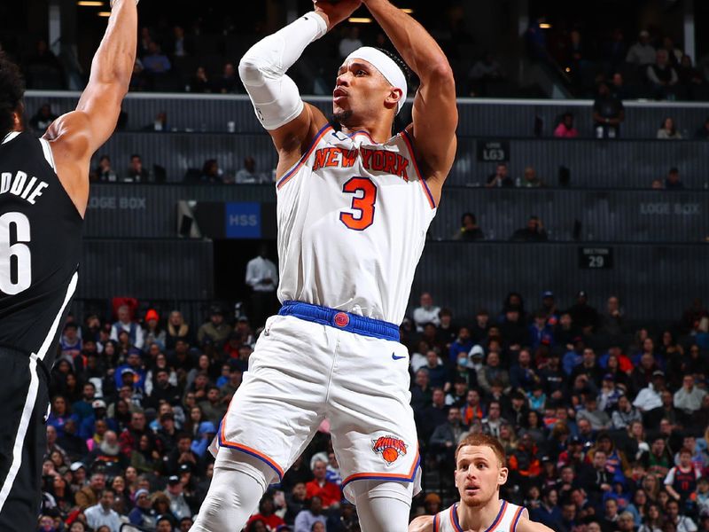 BROOKLYN, NY - JANUARY 23: Josh Hart #3 of the New York Knicks shoots the ball during the game against the Brooklyn Nets on January 23, 2024 at Barclays Center in Brooklyn, New York. NOTE TO USER: User expressly acknowledges and agrees that, by downloading and or using this Photograph, user is consenting to the terms and conditions of the Getty Images License Agreement. Mandatory Copyright Notice: Copyright 2024 NBAE (Photo by David Nemec/NBAE via Getty Images)