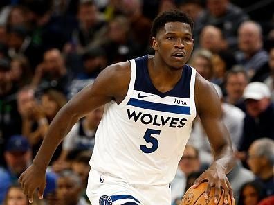 MINNEAPOLIS, MINNESOTA - NOVEMBER 01: Anthony Edwards #5 of the Minnesota Timberwolves dribbles the ball against the Denver Nuggets in the second quarter at Target Center on November 01, 2023 in Minneapolis, Minnesota. The Timberwolves defeated the Nuggets 110-89. NOTE TO USER: User expressly acknowledges and agrees that, by downloading and or using this photograph, User is consenting to the terms and conditions of the Getty Images License Agreement. (Photo by David Berding/Getty Images)