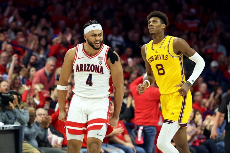 Feb 17, 2024; Tucson, Arizona, USA; Arizona Wildcats guard Kylan Boswell (4) celebrates after making a basket against Arizona State Sun Devils forward Alonzo Gaffney (8) during the first half at McKale Center. Mandatory Credit: Zachary BonDurant-USA TODAY Sports