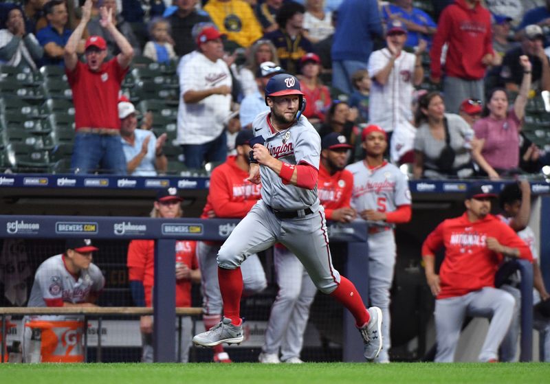 Sep 15, 2023; Milwaukee, Wisconsin, USA; Washington Nationals third baseman Carter Kieboom (8) rounds third base to score a run agains the Milwaukee Brewers in the first inning at American Family Field. Mandatory Credit: Michael McLoone-USA TODAY Sports