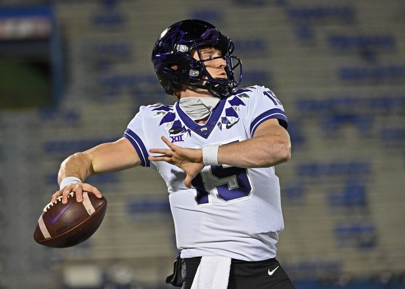 Nov 28, 2020; Lawrence, Kansas, USA; TCU Horned Frogs quarterback Max Duggan (15) throws a pass during pre-game workouts, prior to a game against the Kansas Jayhawks at David Booth Kansas Memorial Stadium. Mandatory Credit: Peter Aiken-USA TODAY Sports