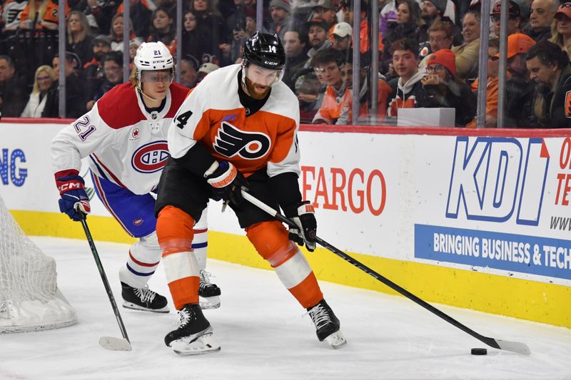 Jan 10, 2024; Philadelphia, Pennsylvania, USA; Philadelphia Flyers center Sean Couturier (14) and Montreal Canadiens defenseman Kaiden Guhle (21) battle for the puck during the first period at Wells Fargo Center. Mandatory Credit: Eric Hartline-USA TODAY Sports