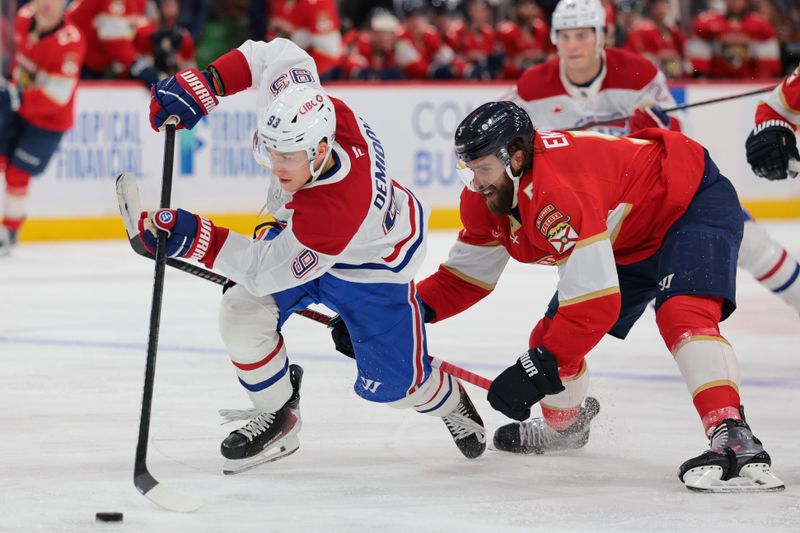 Dec 30, 2025; Sunrise, Florida, USA; Montreal Canadiens right wing Ivan Demidov (93) moves the puck against Florida Panthers defenseman Aaron Ekblad (5)during the second period at Amerant Bank Arena. Mandatory Credit: Sam Navarro-Imagn Images
