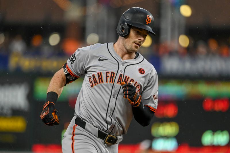 Sep 17, 2024; Baltimore, Maryland, USA; San Francisco Giants outfielder Mike Yastrzemski (5) rounds third base after hitting a first inning solo homerun against the Baltimore Orioles  at Oriole Park at Camden Yards. Mandatory Credit: Tommy Gilligan-Imagn Images