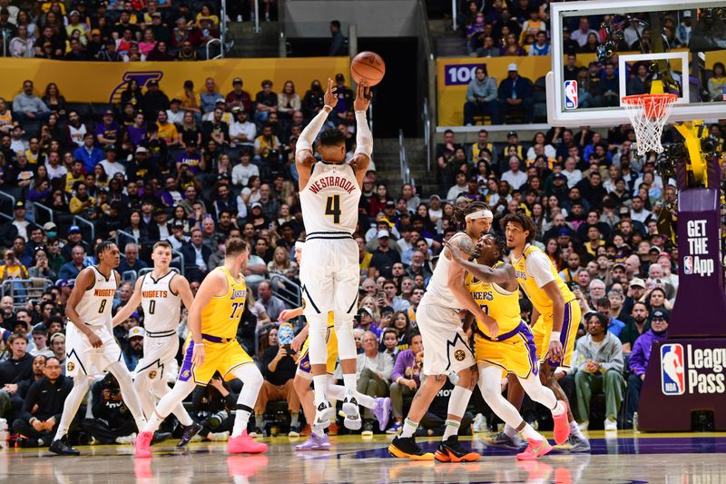 LOS ANGELES, CA - MARCH 19: Russell Westbrook #4 of the Denver Nuggets shoots the ball during the game against the Los Angeles Lakers on March 19, 2025 at Crypto.Com Arena in Los Angeles, California. NOTE TO USER: User expressly acknowledges and agrees that, by downloading and/or using this Photograph, user is consenting to the terms and conditions of the Getty Images License Agreement. Mandatory Copyright Notice: Copyright 2025 NBAE (Photo by Adam Pantozzi/NBAE via Getty Images)