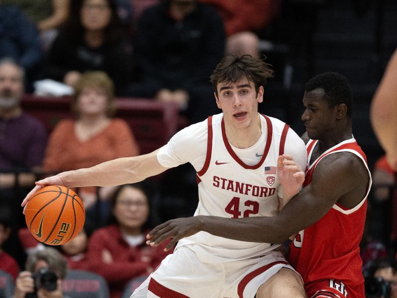 Jan 14, 2024; Stanford, California, USA; Stanford Cardinal forward Maxime Raynaud (42) tries to back down Utah Utes center Keba Keita (13) during the first half at Maples Pavilion. Mandatory Credit: D. Ross Cameron-USA TODAY Sports