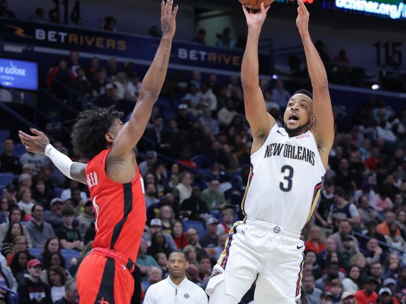 NEW ORLEANS, LOUISIANA - FEBRUARY 22: CJ McCollum #3 of the New Orleans Pelicans shoots over Jalen Green #4 of the Houston Rockets during the second half at the Smoothie King Center on February 22, 2024 in New Orleans, Louisiana. NOTE TO USER: User expressly acknowledges and agrees that, by downloading and or using this Photograph, user is consenting to the terms and conditions of the Getty Images License Agreement. (Photo by Jonathan Bachman/Getty Images)