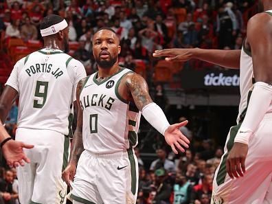 MIAMI, FL - NOVEMBER 28: Damian Lillard #0 of the Milwaukee Bucks high fives Khris Middleton #22 during the game against the Miami Heat during the In-Season Tournament on November 28, 2023 at Kaseya Center in Miami, Florida. NOTE TO USER: User expressly acknowledges and agrees that, by downloading and or using this Photograph, user is consenting to the terms and conditions of the Getty Images License Agreement. Mandatory Copyright Notice: Copyright 2023 NBAE (Photo by Issac Baldizon/NBAE via Getty Images)