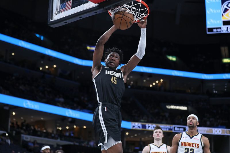 MEMPHIS, TENNESSEE - APRIL 14: GG Jackson #45 of the Memphis Grizzlies dunks during the second half against the Denver Nuggets at FedExForum on April 14, 2024 in Memphis, Tennessee. NOTE TO USER: User expressly acknowledges and agrees that, by downloading and or using this photograph, User is consenting to the terms and conditions of the Getty Images License Agreement. (Photo by Justin Ford/Getty Images)