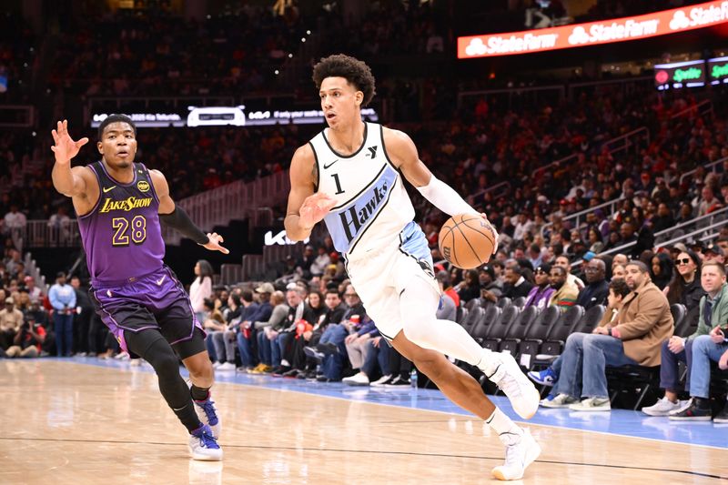 ATLANTA, GA - DECEMBER 6: Jalen Johnson #1 of the Atlanta Hawks drives to the basket during the game against the Los Angeles Lakers on December 6, 2024 at State Farm Arena in Atlanta, Georgia.  NOTE TO USER: User expressly acknowledges and agrees that, by downloading and/or using this Photograph, user is consenting to the terms and conditions of the Getty Images License Agreement. Mandatory Copyright Notice: Copyright 2024 NBAE (Photo by Adam Hagy/NBAE via Getty Images)