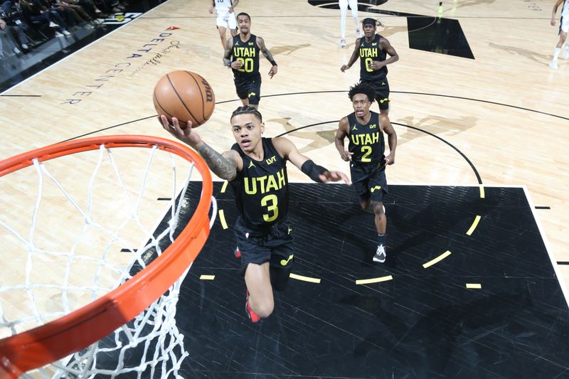 SALT LAKE CITY, UT - MARCH 27: Keyonte George #3 of the Utah Jazz drives to the basket during the game against the San Antonio Spurs on March 27, 2024 at Delta Center in Salt Lake City, Utah. NOTE TO USER: User expressly acknowledges and agrees that, by downloading and or using this Photograph, User is consenting to the terms and conditions of the Getty Images License Agreement. Mandatory Copyright Notice: Copyright 2024 NBAE (Photo by Melissa Majchrzak/NBAE via Getty Images)