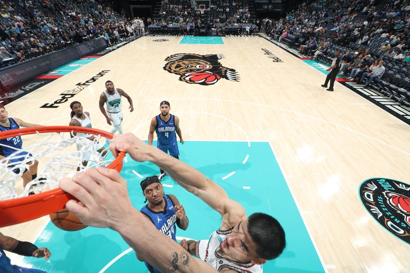 MEMPHIS, TN - OCTOBER 26: Zach Edey #14 of the Memphis Grizzlies dunks the ball during the game against the Orlando Magic on October 26, 2024 at FedExForum in Memphis, Tennessee. NOTE TO USER: User expressly acknowledges and agrees that, by downloading and or using this photograph, User is consenting to the terms and conditions of the Getty Images License Agreement. Mandatory Copyright Notice: Copyright 2024 NBAE (Photo by Joe Murphy/NBAE via Getty Images)