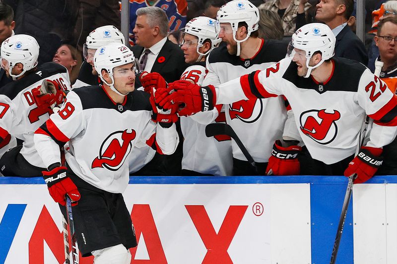 Nov 4, 2024; Edmonton, Alberta, CAN; The New Jersey Devils celebrate a goal by forward Timo Meier (28) during the third period against the Edmonton Oilers at Rogers Place. Mandatory Credit: Perry Nelson-Imagn Images