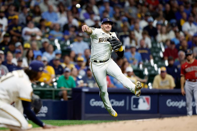 Oct 4, 2023; Milwaukee, Wisconsin, USA; Milwaukee Brewers third baseman Josh Donaldson (3) throws to first in the fourth inning against the Arizona Diamondbacks during game two of the Wildcard series for the 2023 MLB playoffs at American Family Field. Mandatory Credit: Kamil Krzaczynski-USA TODAY Sports