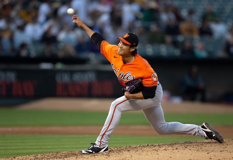 Aug 19, 2023; Oakland, California, USA; Baltimore Orioles pitcher Shintaro Fujinami (14) pitches against the Oakland Athletics during the sixth inning at Oakland-Alameda County Coliseum. Mandatory Credit: D. Ross Cameron-USA TODAY Sports