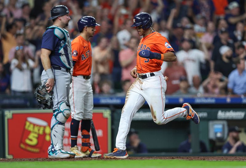 May 3, 2024; Houston, Texas, USA; Houston Astros shortstop Jeremy Pena (3) scores a run during the seventh inning against the Seattle Mariners at Minute Maid Park. Mandatory Credit: Troy Taormina-USA TODAY Sports