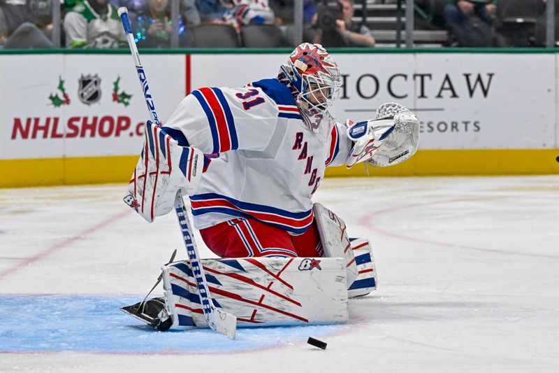 Nov 20, 2023; Dallas, Texas, USA; New York Rangers goaltender Igor Shesterkin (31) makes a save on a Dallas Stars shot during the second period at the American Airlines Center. Mandatory Credit: Jerome Miron-USA TODAY Sports