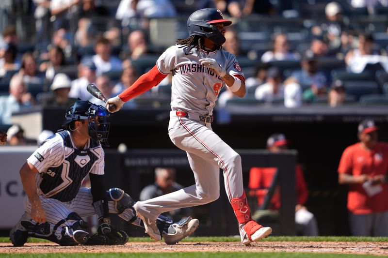 Aug 27, 2025; Bronx, New York, USA; Washington Nationals shortstop CJ Abrams (5) hits an RBI single against the New York Yankees during the sixth inning at Yankee Stadium. Mandatory Credit: Gregory Fisher-Imagn Images