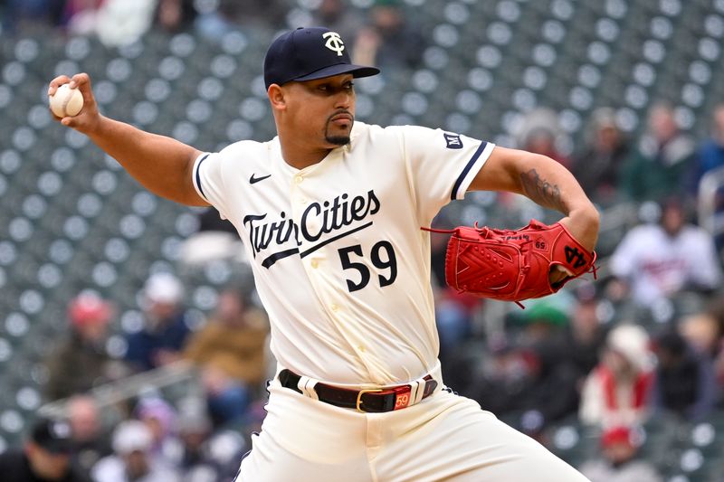 Apr 23, 2023; Minneapolis, Minnesota, USA;  Minnesota Twins pitcher Jhoan Duran (59) delivers against the Washington Nationals at Target Field. Mandatory Credit: Nick Wosika-USA TODAY Sports