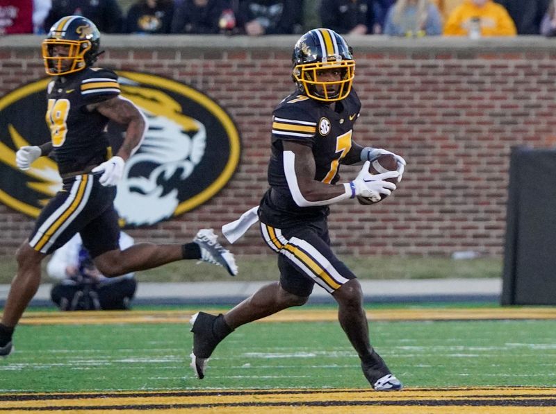 Nov 25, 2022; Columbia, Missouri, USA; Missouri Tigers wide receiver Dominic Lovett (7) catches a pass against the Arkansas Razorbacks during the second half at Faurot Field at Memorial Stadium. Mandatory Credit: Denny Medley-USA TODAY Sports