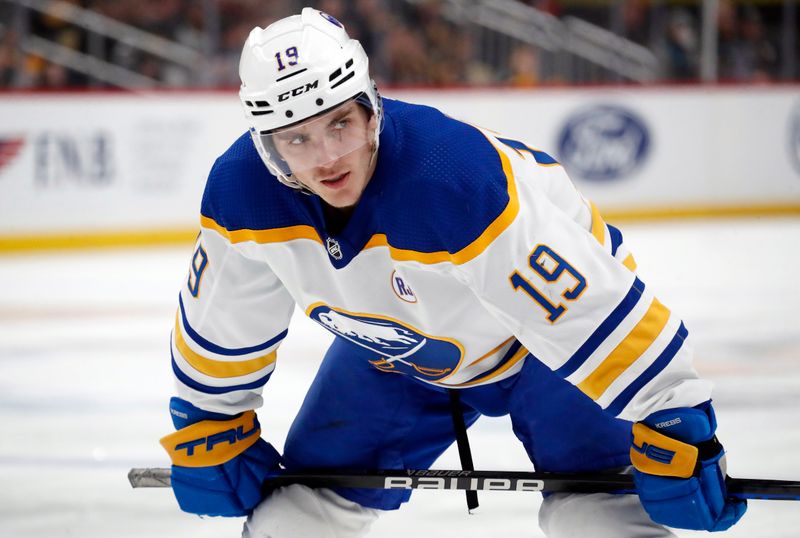 Jan 6, 2024; Pittsburgh, Pennsylvania, USA;  Buffalo Sabres center Peyton Krebs (19) prepares to take a face-off against the Pittsburgh Penguins during the second period at PPG Paints Arena. Mandatory Credit: Charles LeClaire-USA TODAY Sports