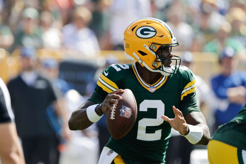 Green Bay Packers quarterback Malik Willis (2) looks for an open receiver during the first half of an NFL football game against the Indianapolis Colts Sunday, Sept. 15, 2024, in Green Bay, Wis. (AP Photo/Mike Roemer)