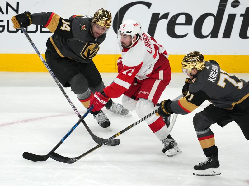 Jan 19, 2023; Las Vegas, Nevada, USA; Detroit Red Wings center Dylan Larkin (71) skates between Vegas Golden Knights defenseman Nicolas Hague (14) and center William Karlsson (71) during the third period at T-Mobile Arena. Mandatory Credit: Stephen R. Sylvanie-USA TODAY Sports