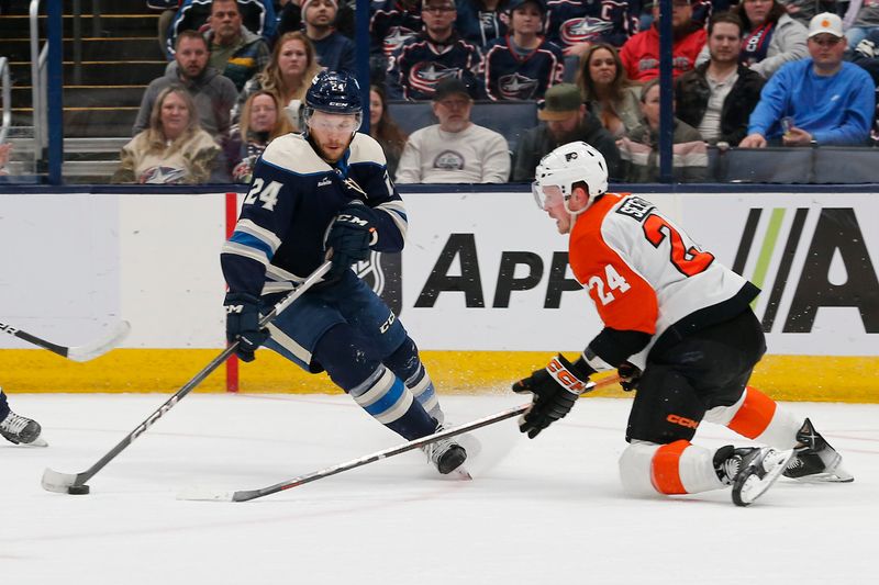 Apr 6, 2024; Columbus, Ohio, USA; Columbus Blue Jackets right wing Mathieu Olivier (24) skates away from Philadelphia Flyers defenseman Nick Seeler (24) during the first period at Nationwide Arena. Mandatory Credit: Russell LaBounty-USA TODAY Sports