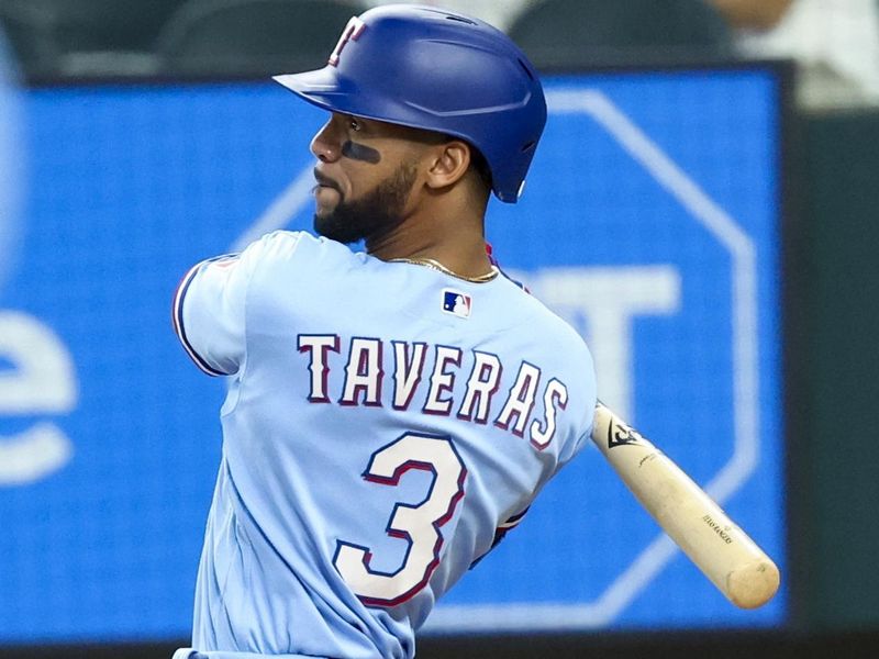 Jul 23, 2023; Arlington, Texas, USA;  Texas Rangers center fielder Leody Taveras (3) hits a two-run double during the third inning against the Los Angeles Dodgers at Globe Life Field. Mandatory Credit: Kevin Jairaj-USA TODAY Sports