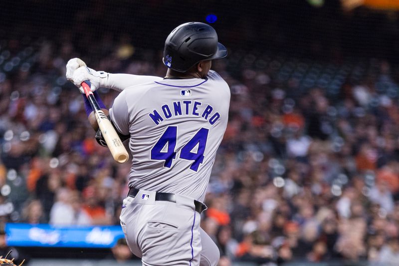 May 17, 2024; San Francisco, California, USA; Colorado Rockies first baseman Elehuris Montero (44) hits a single against the San Francisco Giants during the fourth inning at Oracle Park. Mandatory Credit: John Hefti-USA TODAY Sports