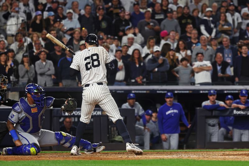 Oct 5, 2024; Bronx, New York, USA; New York Yankees catcher Austin Wells (28) walks after a hit during the fifth inning against the Kansas City Royals during game one of the ALDS for the 2024 MLB Playoffs at Yankee Stadium. Mandatory Credit: Vincent Carchietta-Imagn Images