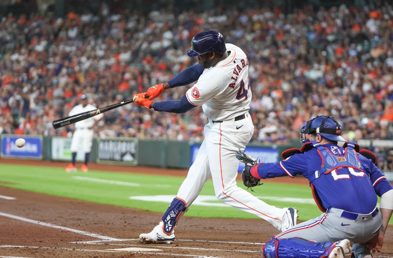 Apr 13, 2024; Houston, Texas, USA;  Houston Astros left fielder Yordan Alvarez (44) hits a single against the Texas Rangers in the first inning at Minute Maid Park. Mandatory Credit: Thomas Shea-USA TODAY Sports