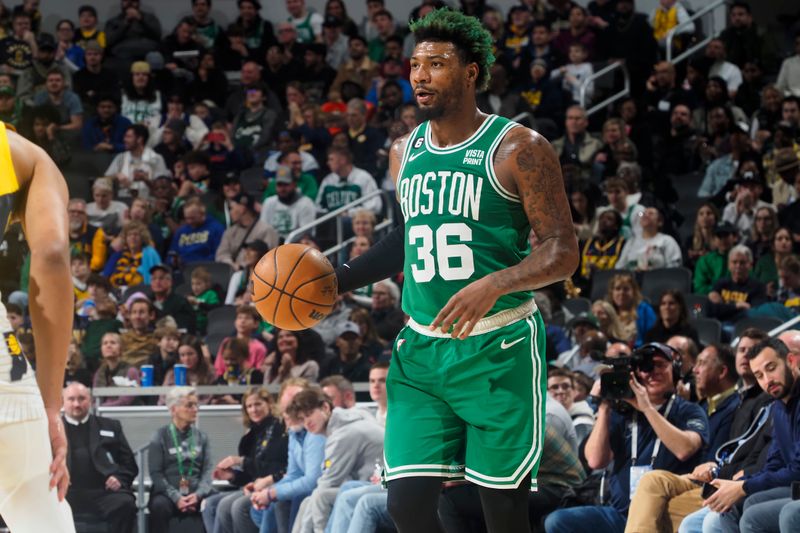 INDIANAPOLIS, IN - FEBRUARY 23: Marcus Smart #36 of the Boston Celtics moves the ball during the game against the Indiana Pacers on February 23, 2023 at Gainbridge Fieldhouse in Indianapolis, Indiana. NOTE TO USER: User expressly acknowledges and agrees that, by downloading and or using this Photograph, user is consenting to the terms and conditions of the Getty Images License Agreement. Mandatory Copyright Notice: Copyright 2023 NBAE (Photo by Ron Hoskins/NBAE via Getty Images)