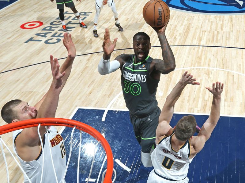 MINNEAPOLIS, MN -  NOVEMBER 1: Julius Randle #30 of the Minnesota Timberwolves shoots the ball during the game against the Denver Nuggets on November 1, 2024 at Target Center in Minneapolis, Minnesota. NOTE TO USER: User expressly acknowledges and agrees that, by downloading and or using this Photograph, user is consenting to the terms and conditions of the Getty Images License Agreement. Mandatory Copyright Notice: Copyright 2024 NBAE (Photo by David Sherman/NBAE via Getty Images)