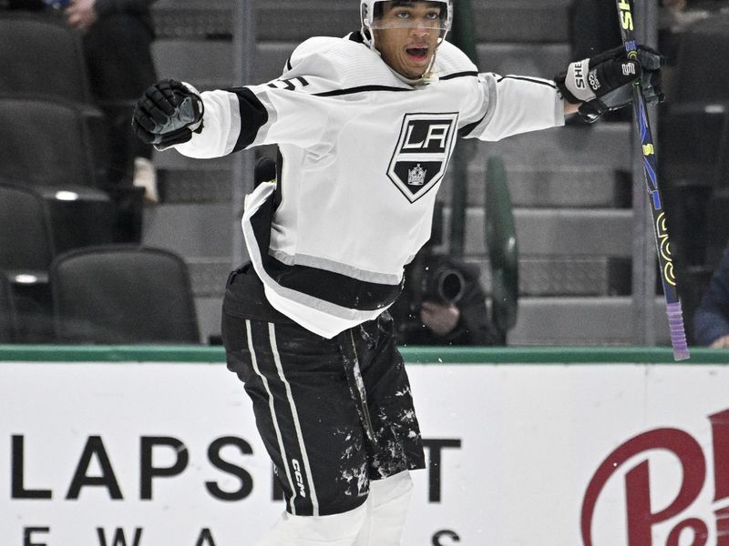 Jan 16, 2024; Dallas, Texas, USA; Los Angeles Kings right wing Quinton Byfield (55) celebrates a goal scored by defenseman Drew Doughty (not pictured) against the Dallas Stars during the second period at the American Airlines Center. Mandatory Credit: Jerome Miron-USA TODAY Sports