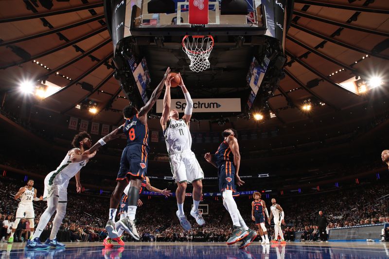 NEW YORK, NY - NOVEMBER 8: Brook Lopez #11 of the Milwaukee Bucks drives to the basket during the game against the New York Knicks on November 8, 2024 at Madison Square Garden in New York City, New York.  NOTE TO USER: User expressly acknowledges and agrees that, by downloading and or using this photograph, User is consenting to the terms and conditions of the Getty Images License Agreement. Mandatory Copyright Notice: Copyright 2024 NBAE  (Photo by Nathaniel S. Butler/NBAE via Getty Images)