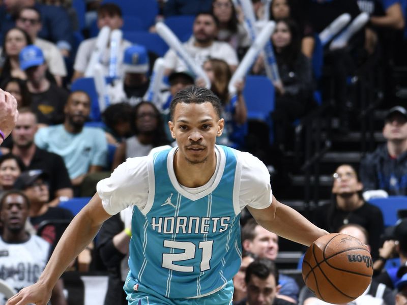 ORLANDO, FL - FEBRUARY 12: Isaiah Wong #21 of the Charlotte Hornets dribbles the ball during the game against the Orlando Magic on February 12, 2025 at Kia Center in Orlando, Florida. NOTE TO USER: User expressly acknowledges and agrees that, by downloading and or using this photograph, User is consenting to the terms and conditions of the Getty Images License Agreement. Mandatory Copyright Notice: Copyright 2025 NBAE (Photo by Fernando Medina/NBAE via Getty Images)