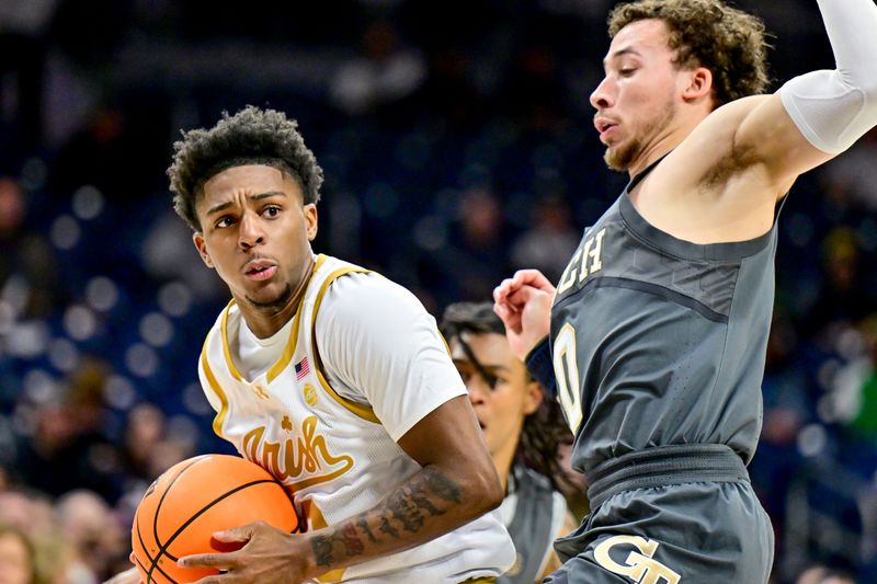 Jan 28, 2025; South Bend, Indiana, USA; Notre Dame Fighting Irish guard Markus Burton (3) drives to the basket as Georgia Tech Yellow Jackets guard Lance Terry (0) defends in the first half at the Purcell Pavilion. Mandatory Credit: Matt Cashore-Imagn Images